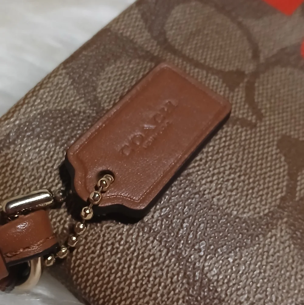Coach Signature Canvas Wristlet with Red and Purple Stripe
